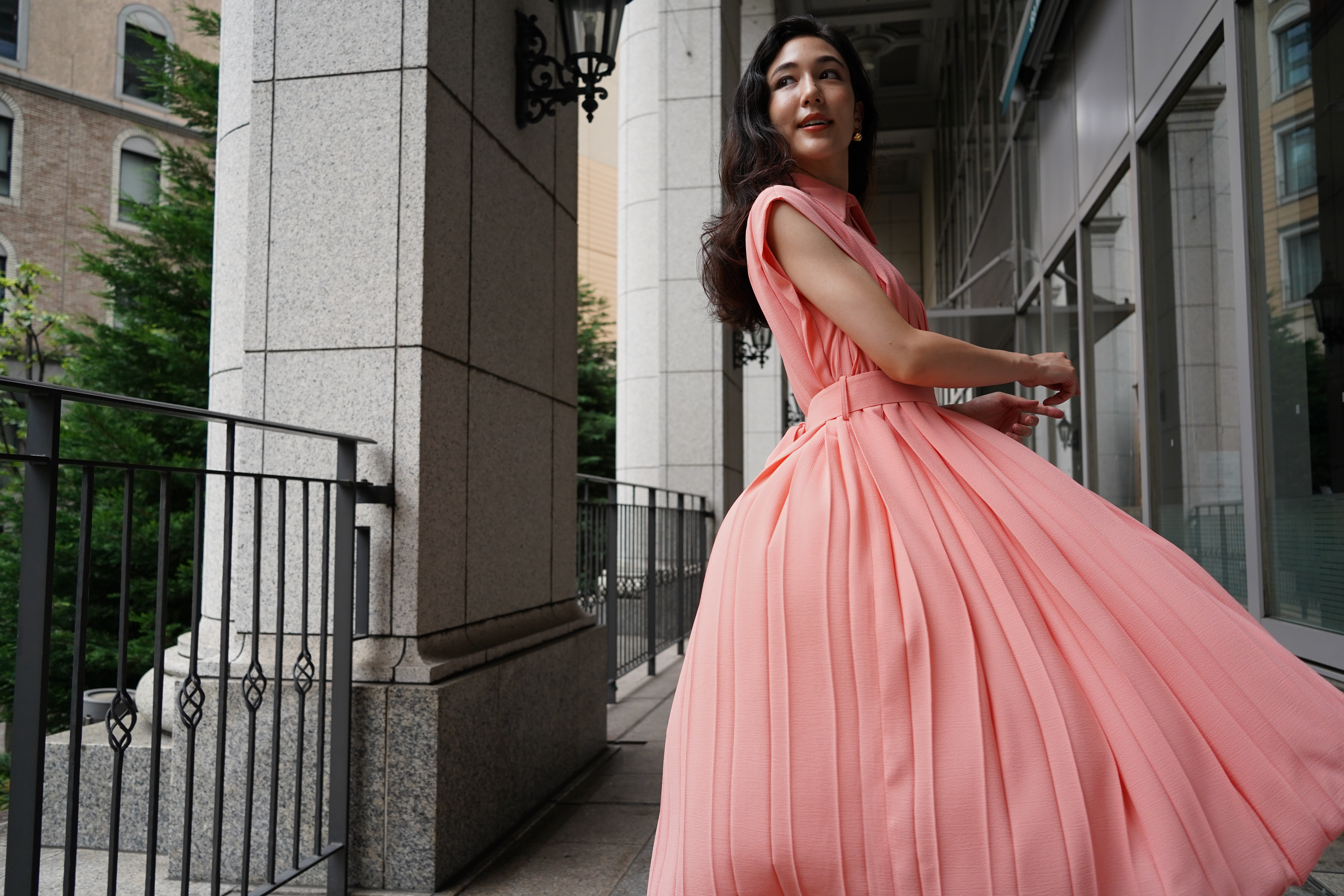 Girl in pink dress slow motion turn